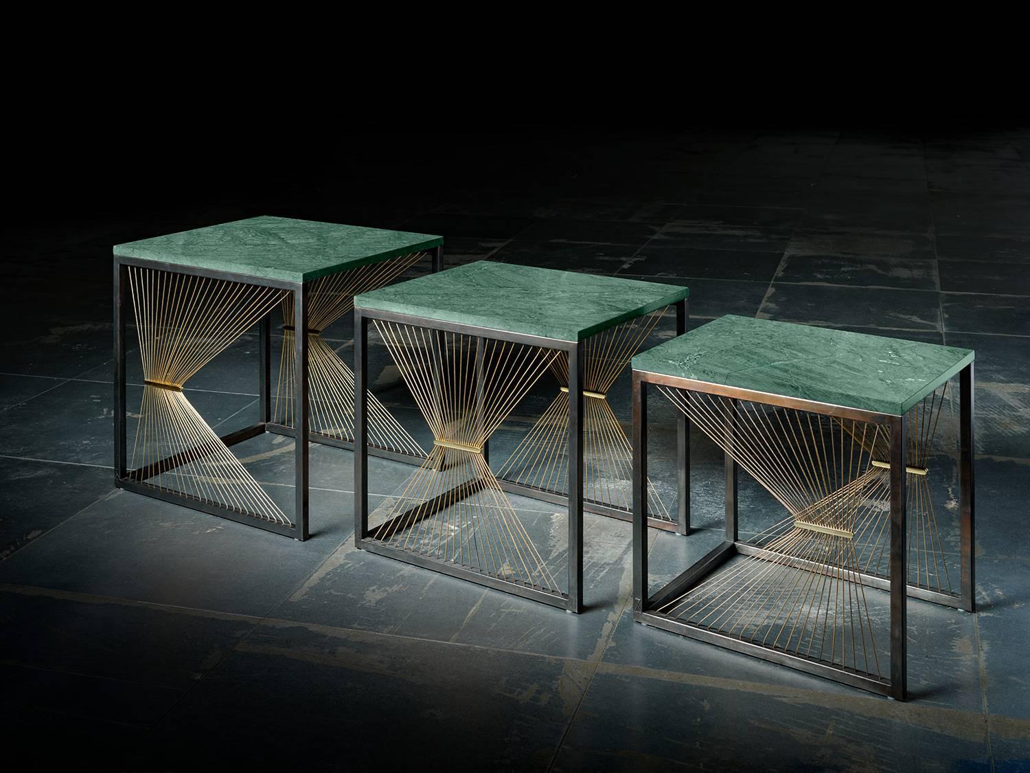 AEGIS 001 nesting tables are made to order using stainless steel, brass plates, marble and gold steel wire. A modern contemporary design using only the finest materials and manufacturing methods. Every element is sourced in Italy and is assembled