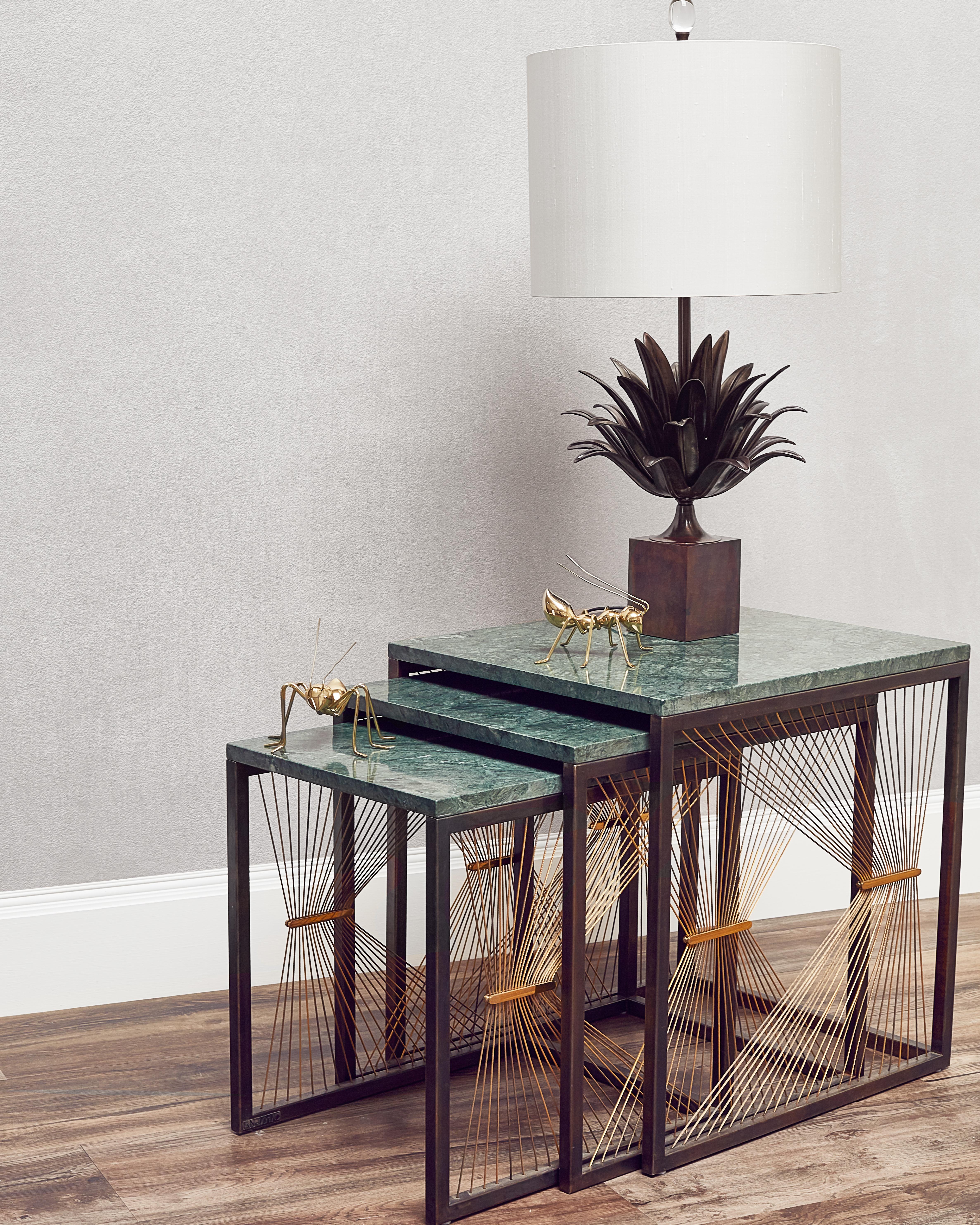 AEGIS 001-T2 set of two nesting tables are made to order using stainless steel, brass plates, marble and gold steel wire. A modern contemporary design using only the finest materials and manufacturing methods. Every element is sourced in Italy and