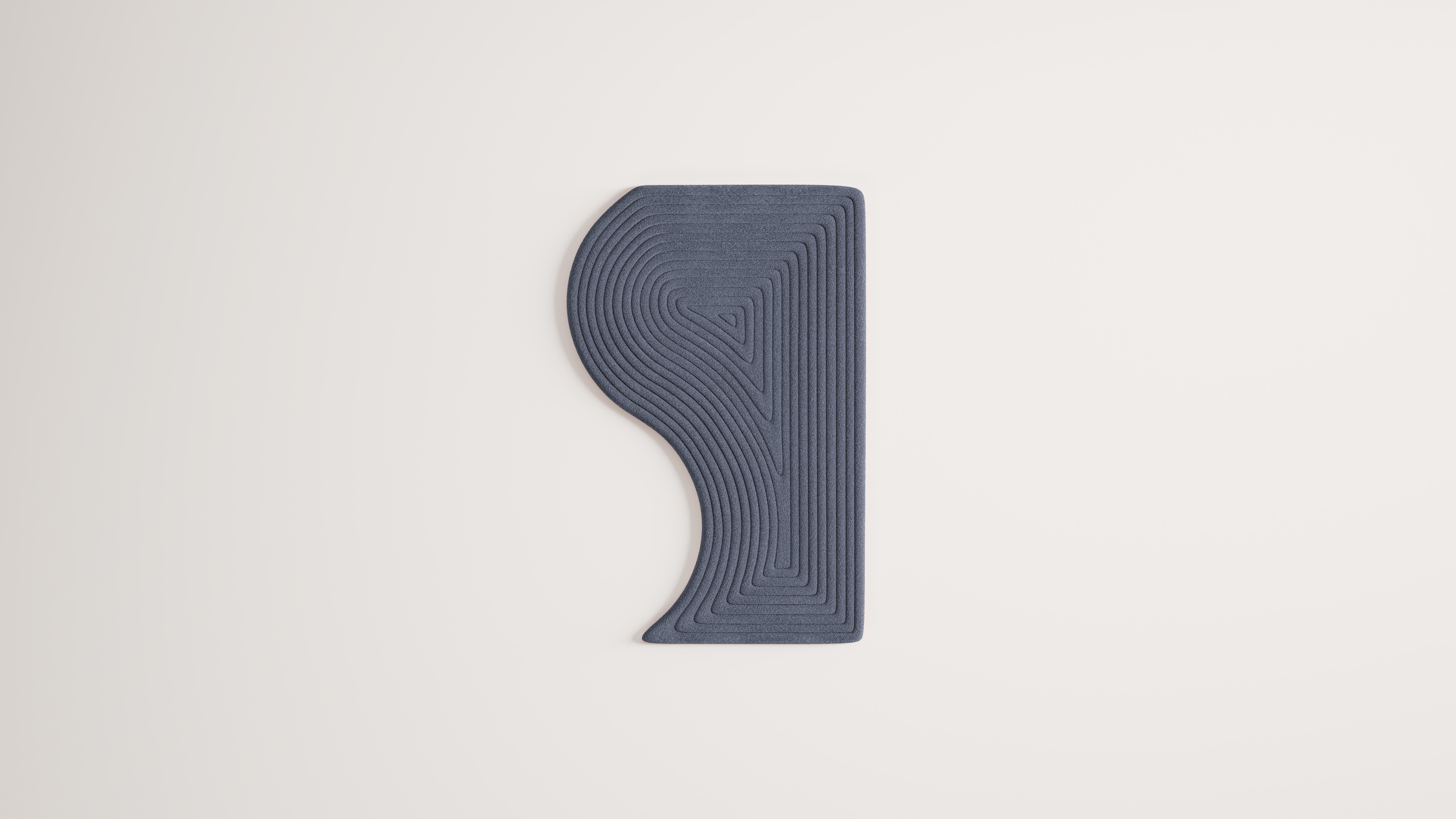 Niwa è una collezione di tappeti modulari minimali e organici. Ogni modulo può essere combinato con altri in infiniti modi per creare configurazioni personalizzabili. 

Questa collezione rappresenta l'elemento sabbia dei giardini zen. I tappeti