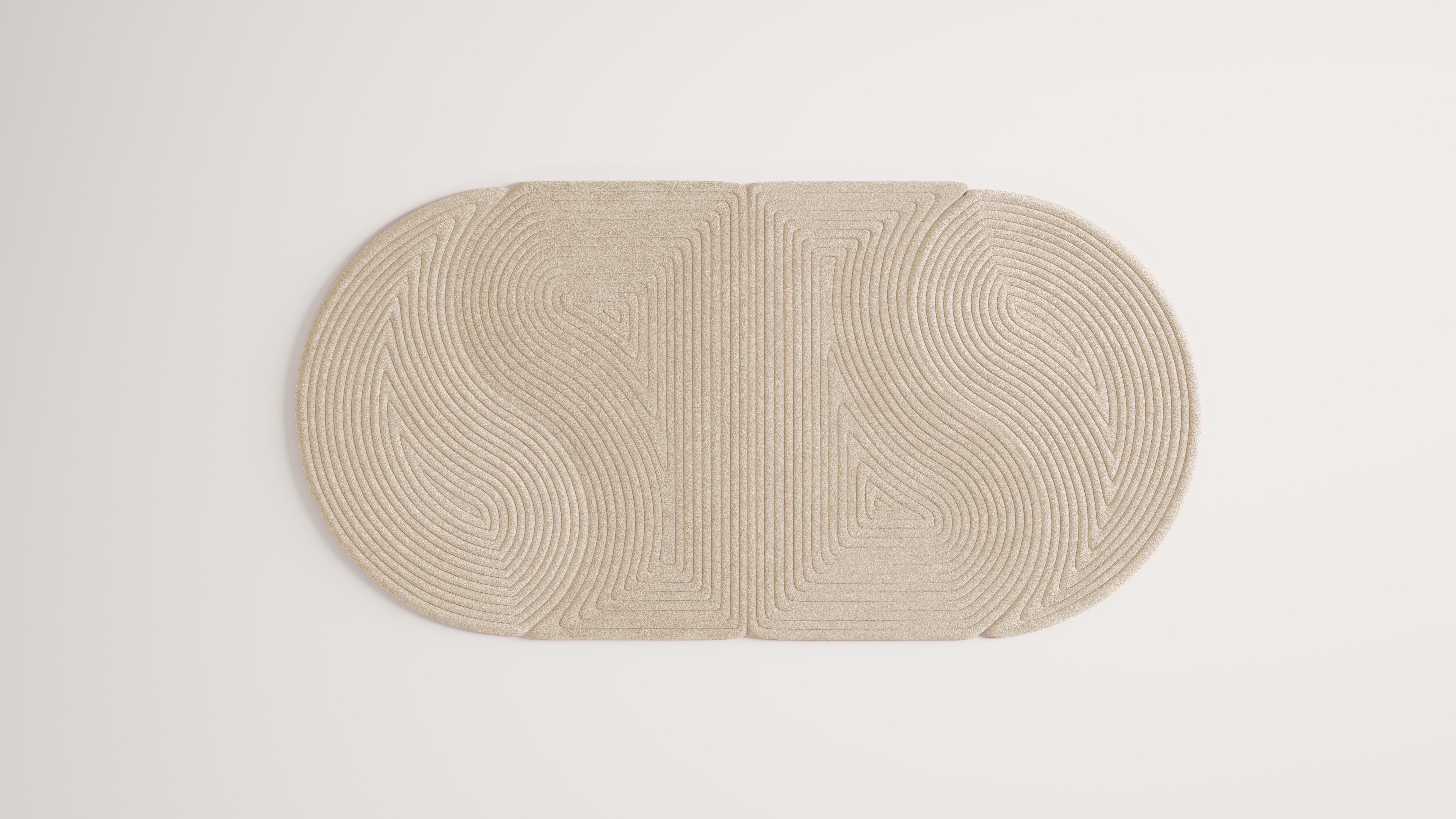 Niwa is a collection of minimal and organic modular rugs. Each module can be combined with others in endless ways to create customizable configurations. 

This collection is a representation of the sand element within Zen Gardens. The rugs provide