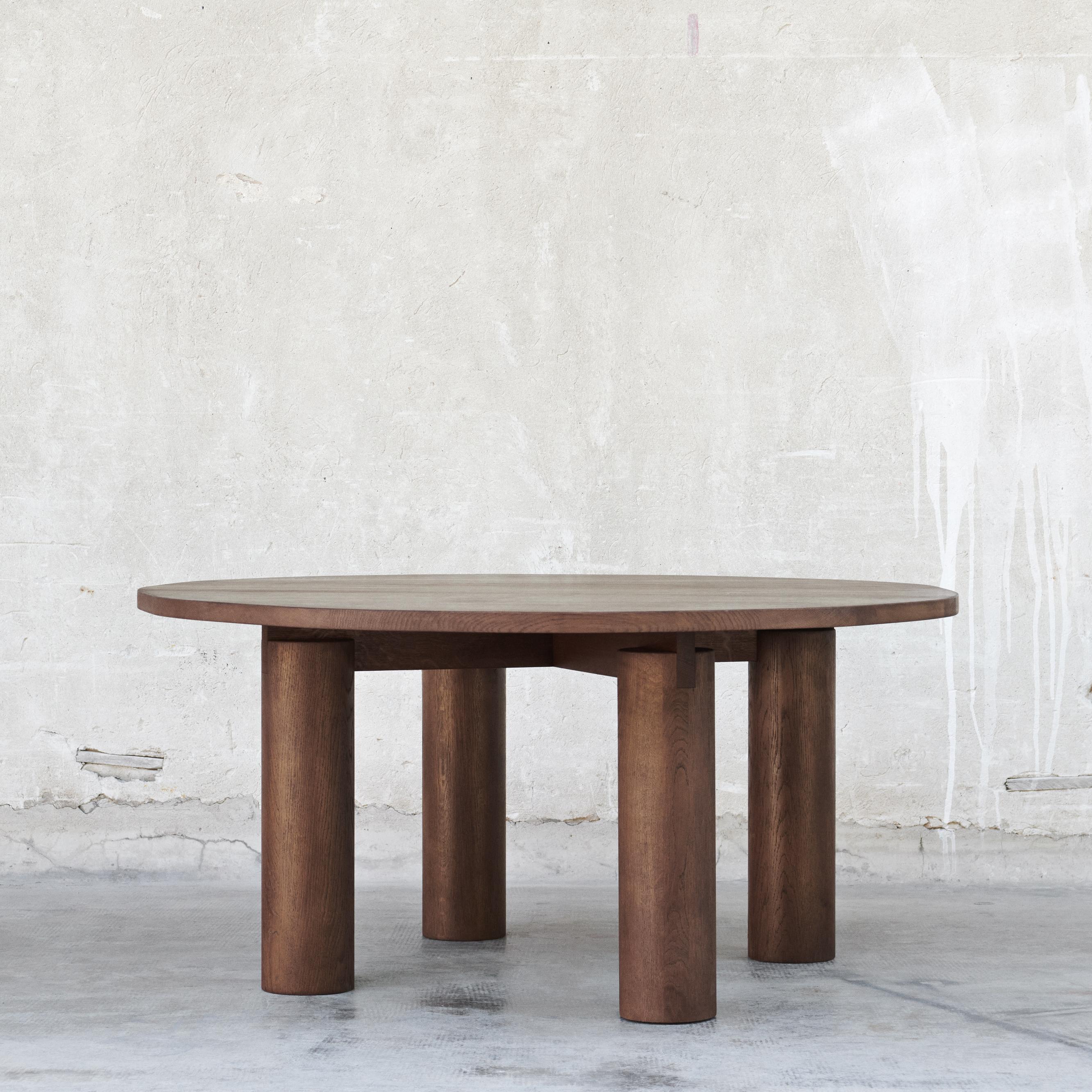 NLM Dining Table by Fora Projects 
Designed by Nikolaj Lorentz Mentze (Studio 0405)

Material: Oak wood 
Model shown: Dark brown
Brown surface treatment with non-toxic hardwax oil

Dimensions:

H: 72, L: 155, W: 145
