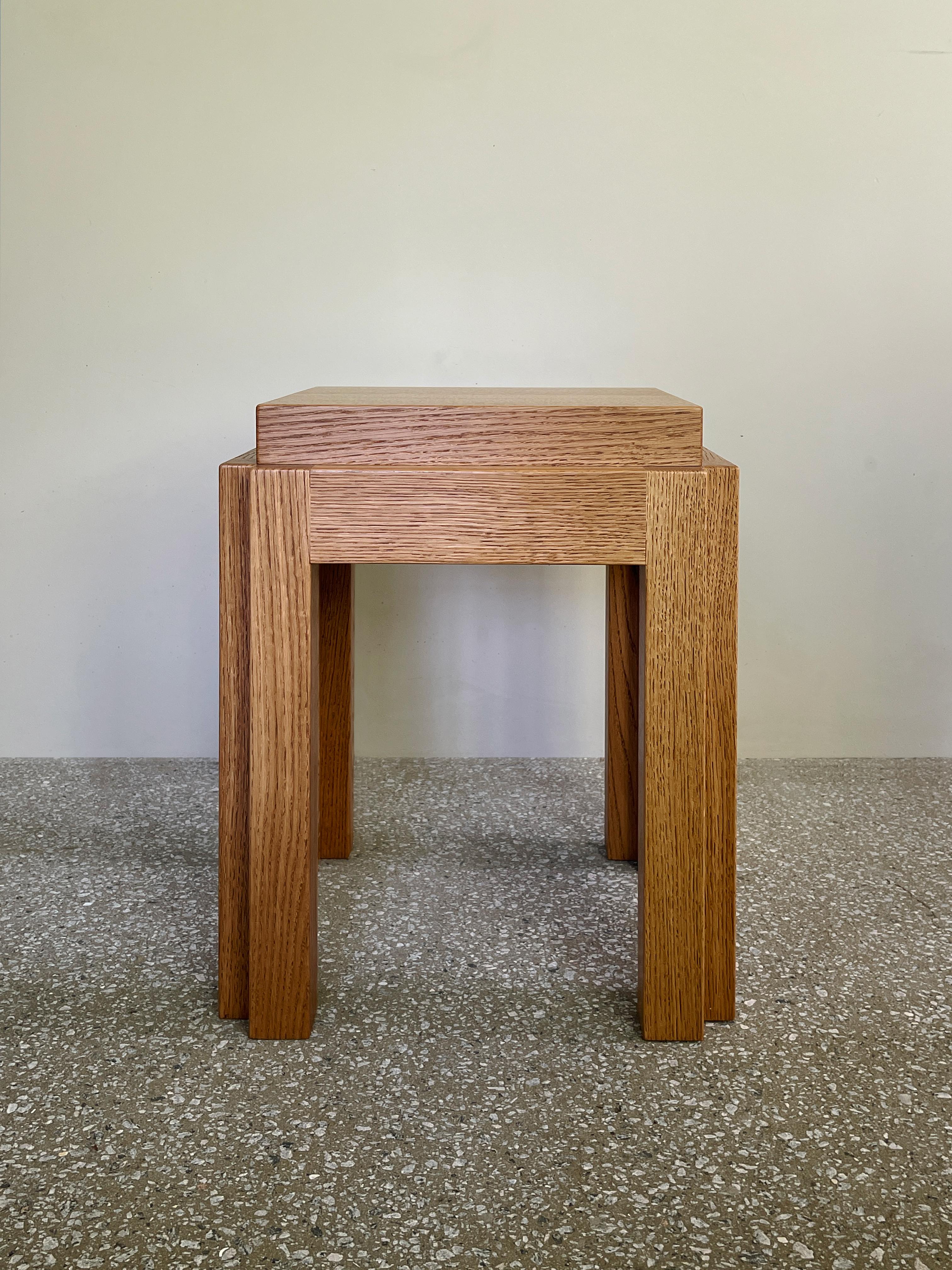 BD Side Table / Stool by Fora Projects 
Designed by Bahraini-Danish

Material: Oak wood
Color: Medium brown
Brown surface treatment with non-toxic hardwax oil

Dimensions:
H. 46 – L. 35 – W. 33 cm

_______________

The BD side table was designed by