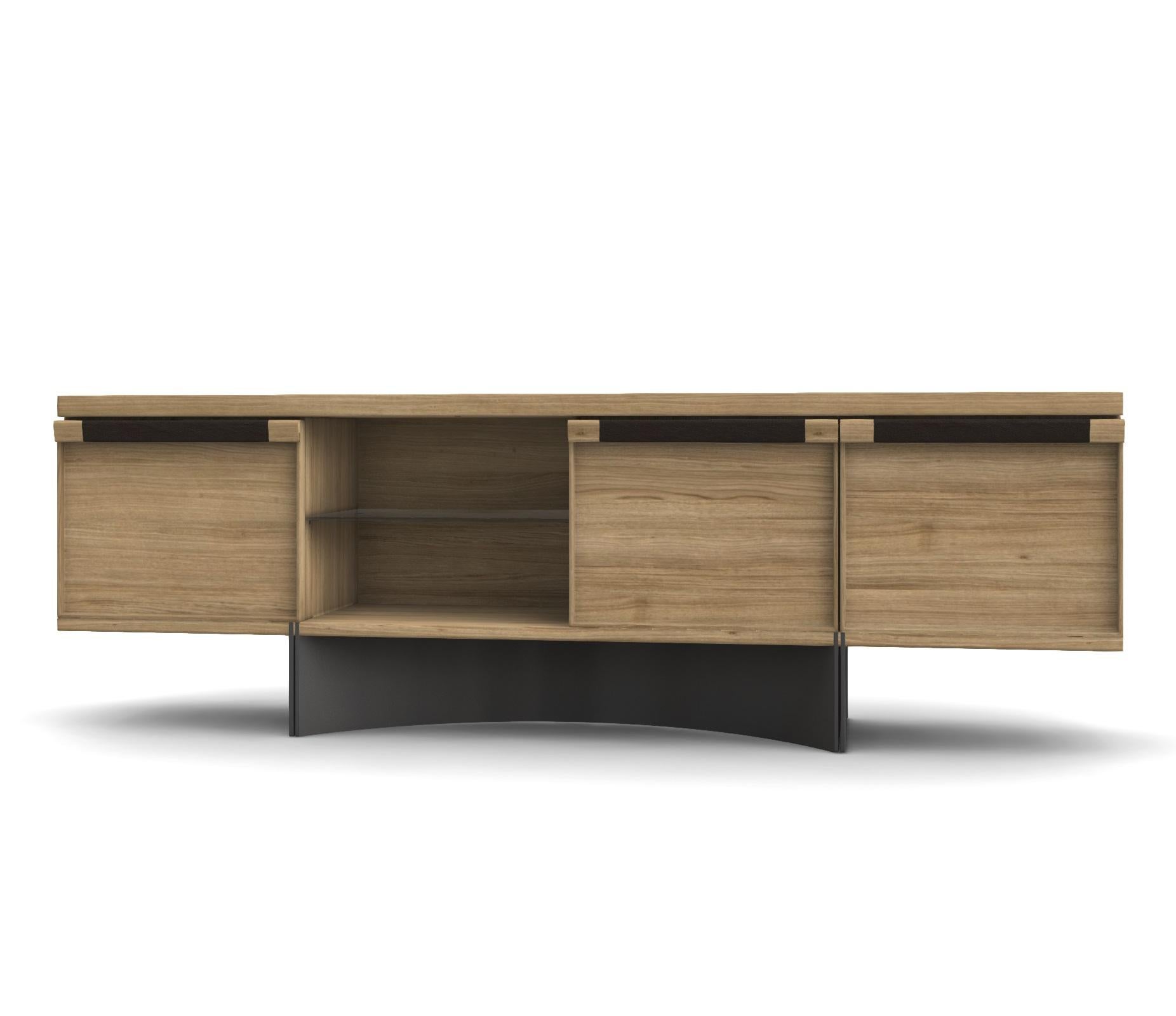 This sideboard is an ideal choice for any contemporary setting, which features the luxe mix of sophisticated materials. Oak is used to form the frame completely, providing it a warm, earthy appearance, perfectly complemented by the shine of a