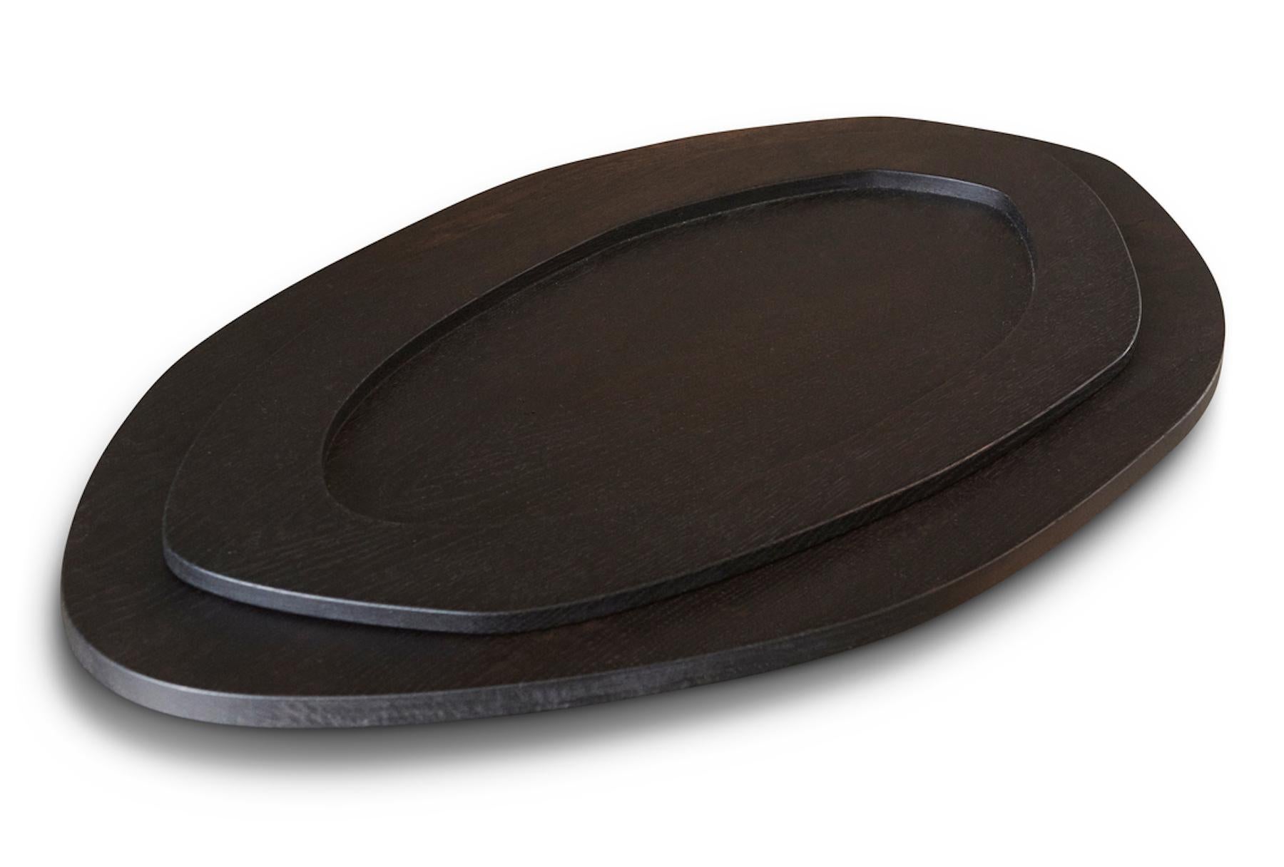 C + J Oak Tray by Fora Projects 
Designed by Christian + Jade

Material: Oak wood 
Color: Black brown
Brown surface treatment with non-toxic hardwax oil

Dimensions: (Medium) 
H. 3 - L. 73 - W. 35 cm 

_______________

The C + J tray was designed by