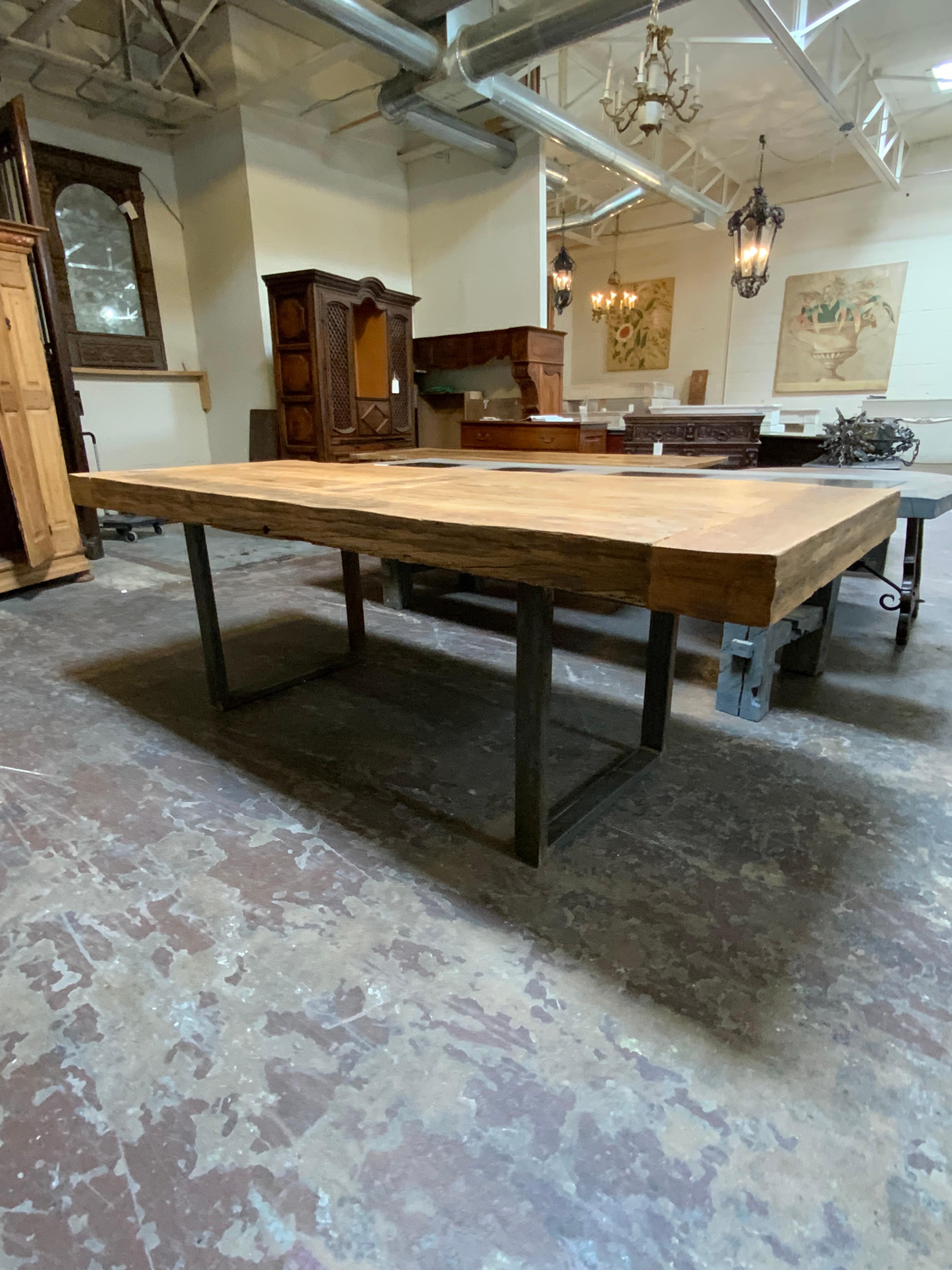 Beautiful hand made table measuring over 8 ft long. This eye-catching table is made of antique oak. Origin France.