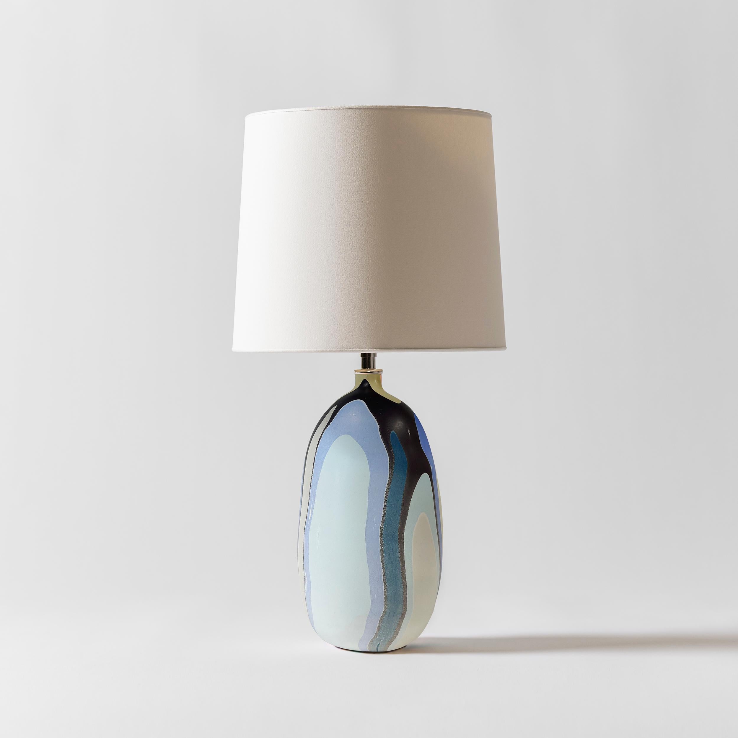 Our Hydro collection is inspired by the grooves and patterns that waterways make through the landscape as seen from above. The layers of gradation in the pigment on the exterior of the bases reference topographical maps. We take queues for our