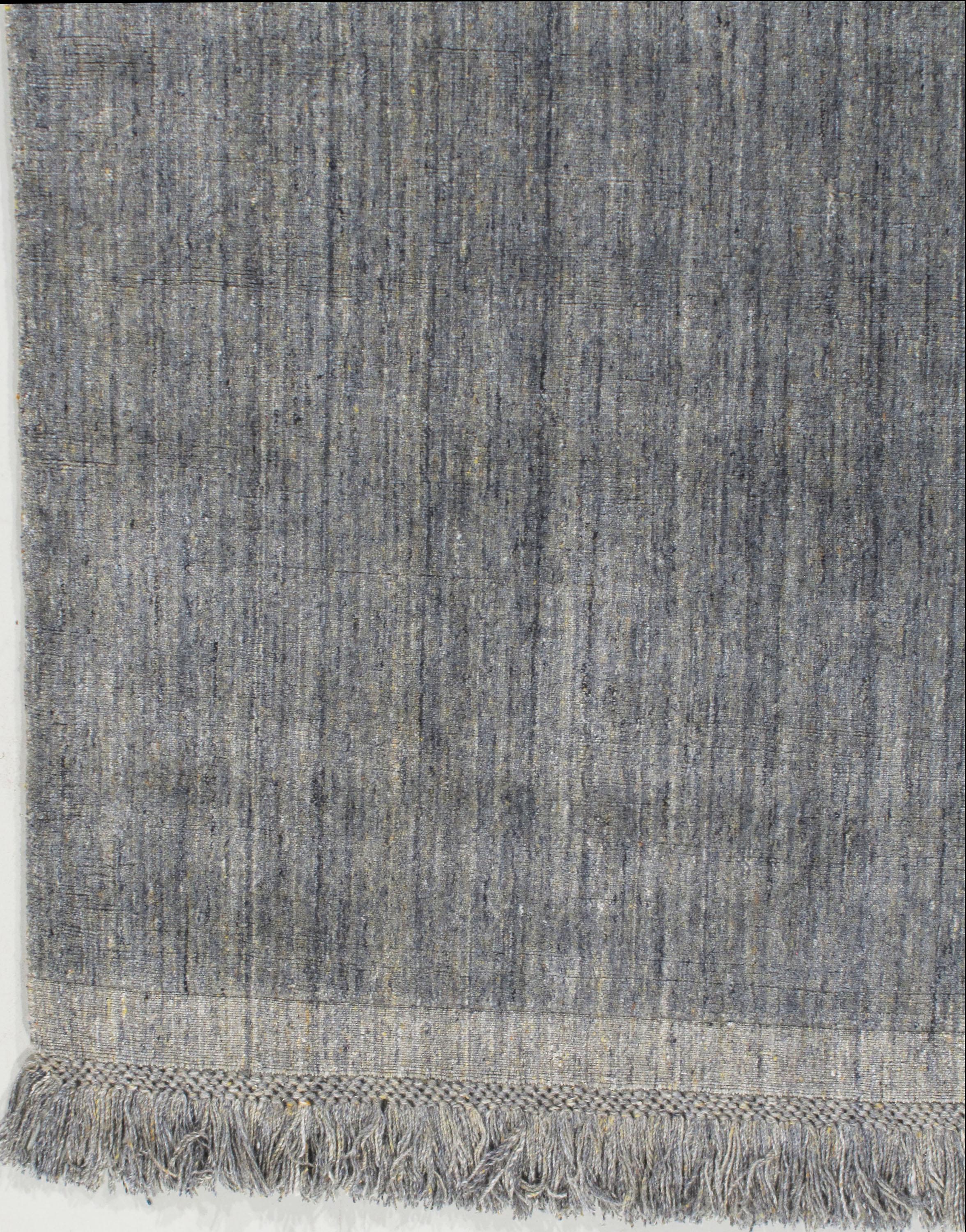 Contemporary Omni Area rug blue 4' x 6'. A hand knotted contemporary rug with a simple but attractive pattern.