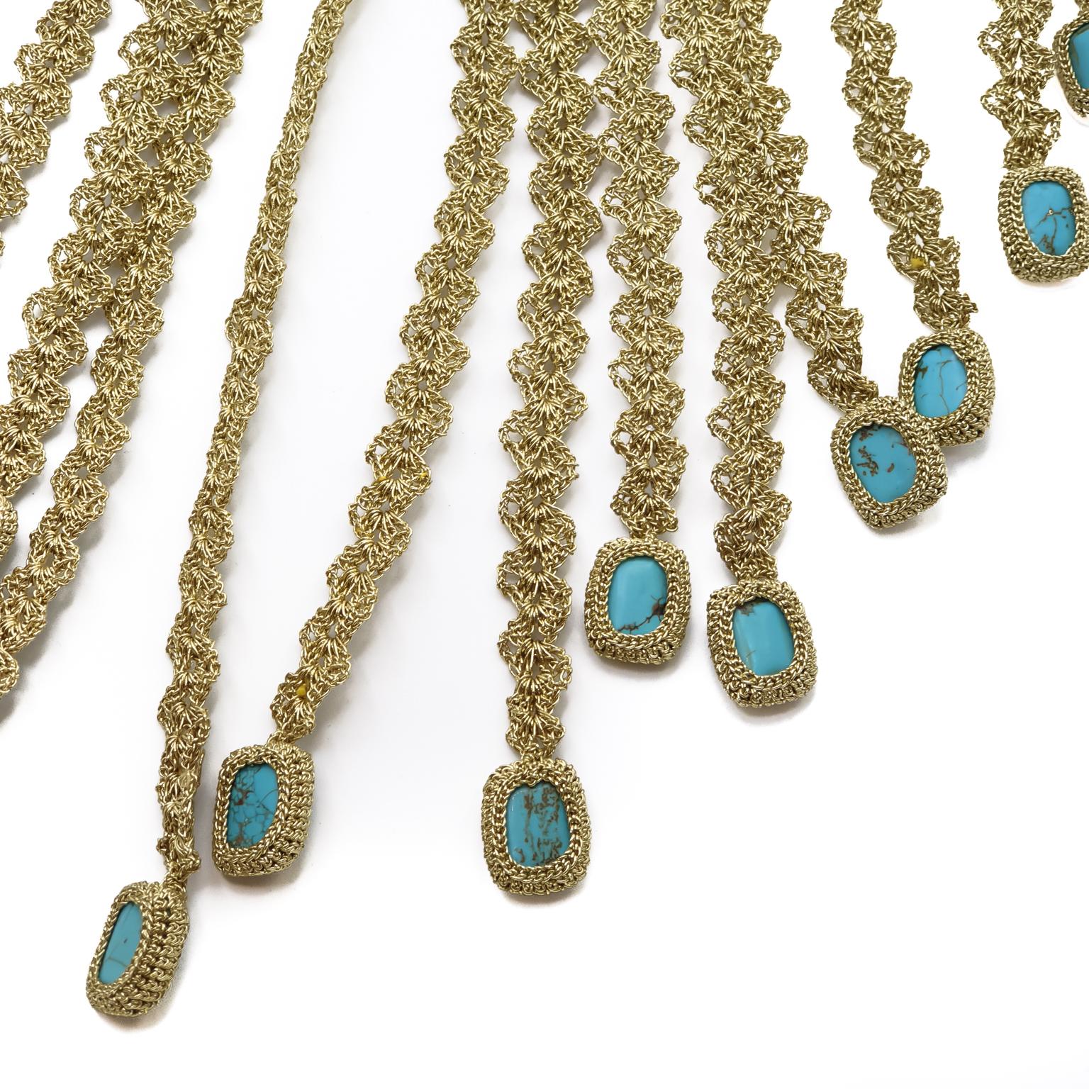 This is a one of a kind contemporary crochet necklace. It is a statement piece. The stones are 16x12mm Turquoise. It is hip and fresh and very unique.

The necklace is crochet with a smooth passing thread. It is a cotton thread coated with a gold