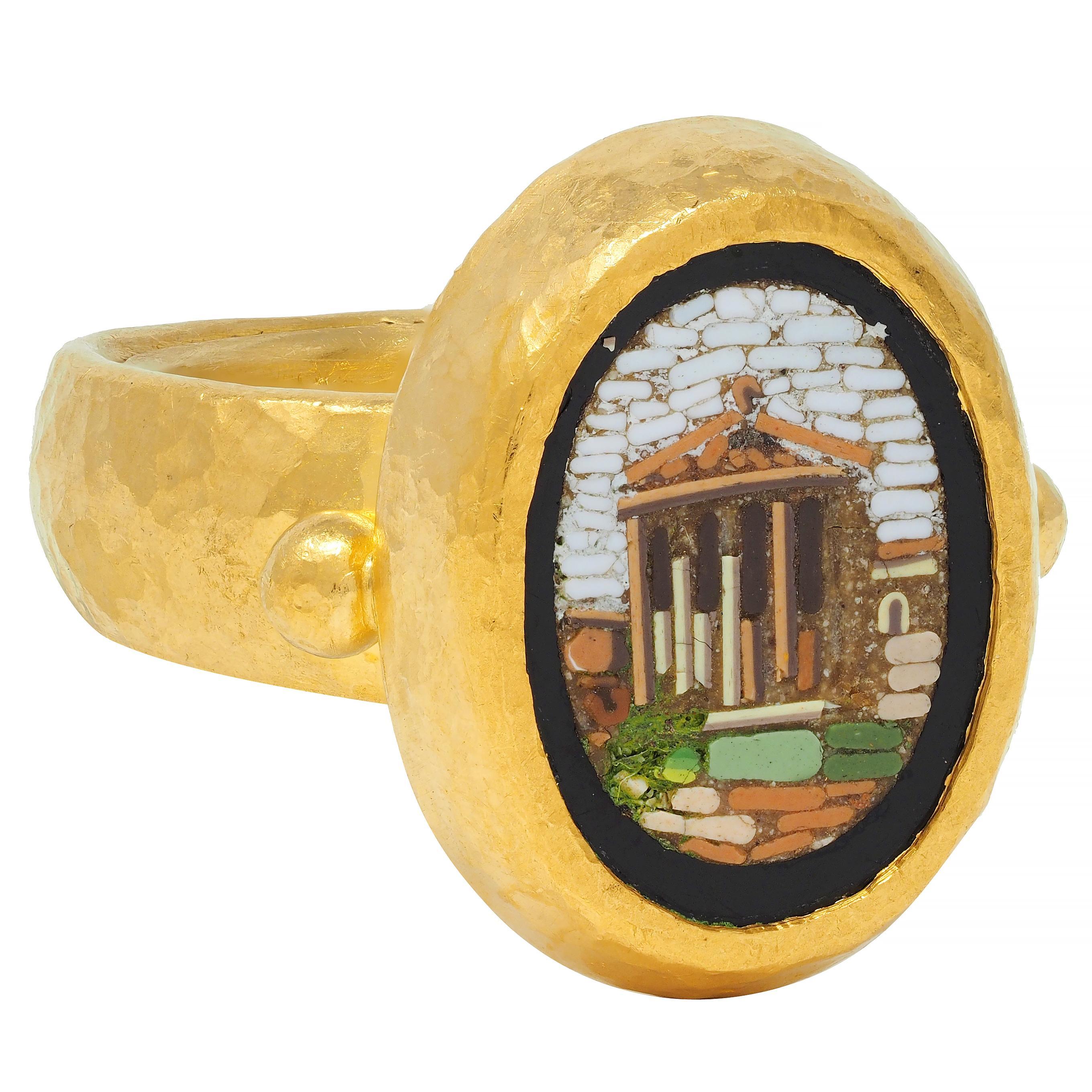 Centering a detailed micro-mosaic portrait of the Parthenon in Greece 
Opaque brown, green, black, white, blue, and reddish brown - exhibiting some loss
With inlaid into an onyx halo surround - opaque glossy black 
Set in a gold bezel and flanked by