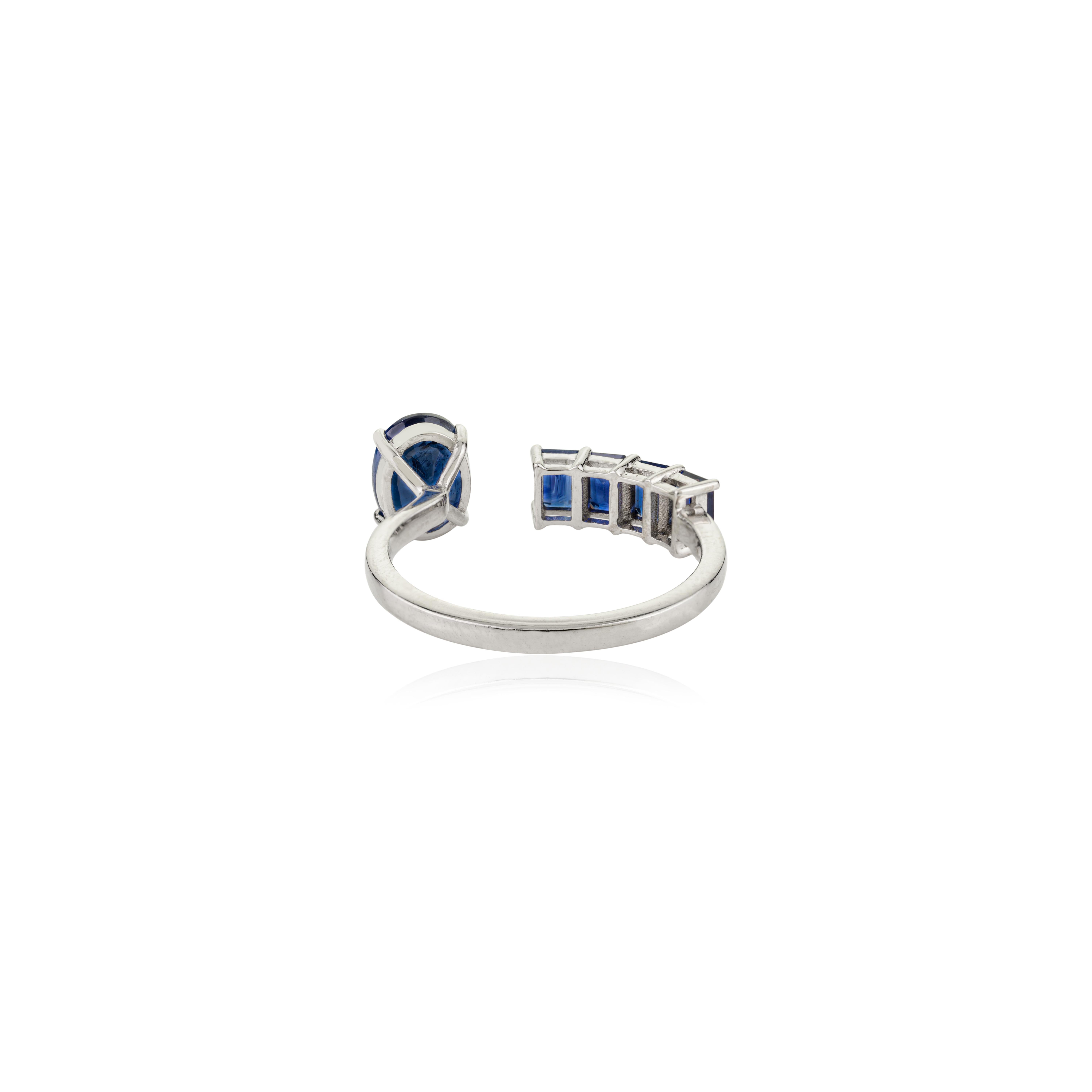For Sale:  Contemporary Open Band Ring with 14k White Gold Oval and Baguette Blue Sapphire 7