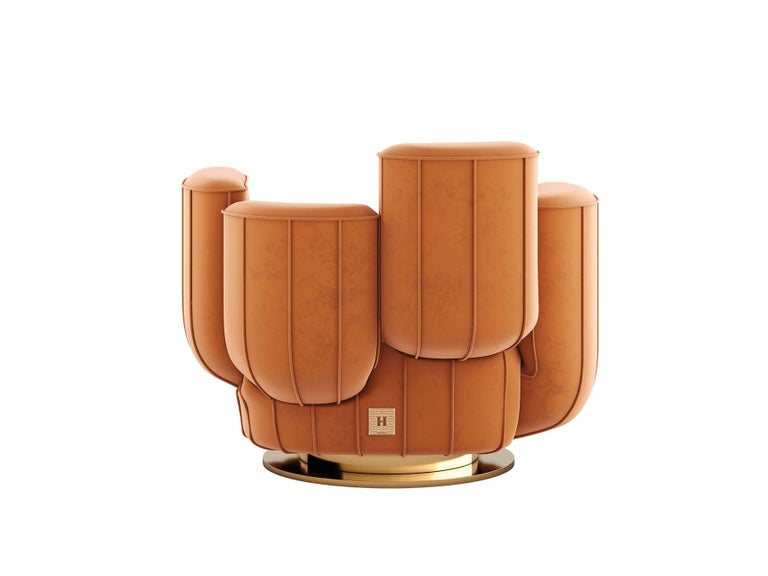 Ajui Armchair is a luxury armchair that features an artsy interpretation of a cactus and a swivel base. It is upholstered in velvet with structure and base in polished brass. This modern armchair is a conceptual piece and the perfect choice for a