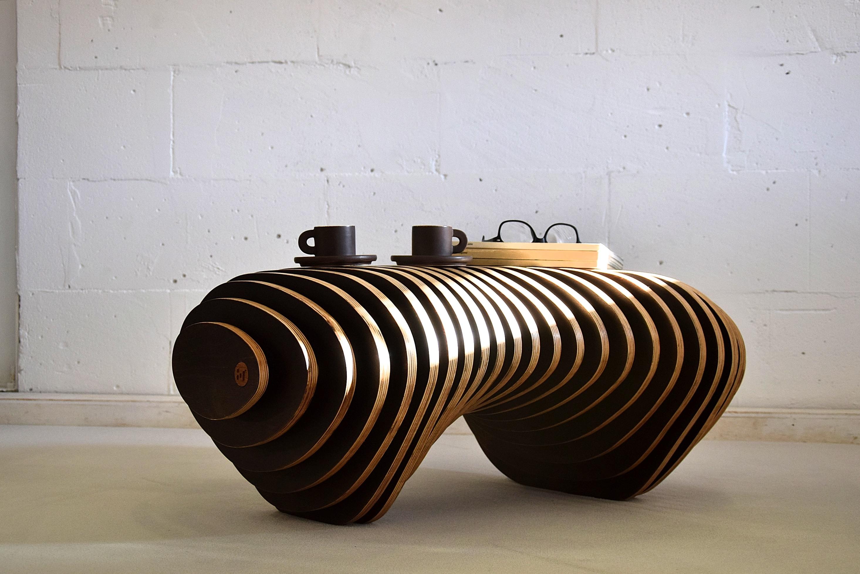 Organic coffee table / bench designed by the Italian architect Lorenzo Capanna and handmade in Italy.

Lorenzo Capanna is a very creative and talented architect who created this stunning piece.

Measurements: L.76 x D.62 x H.34 cm. L.29.921 x
