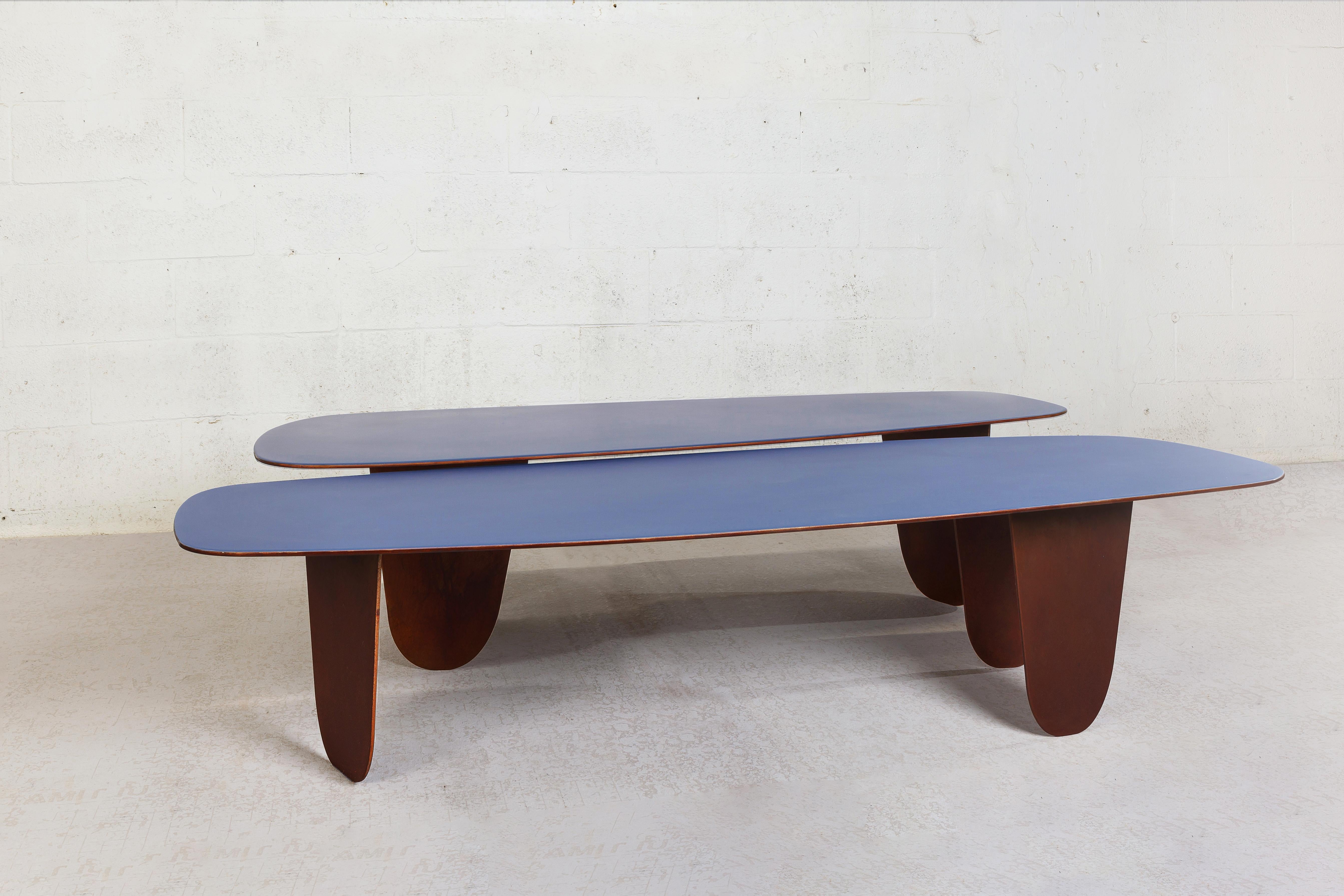 The Osaka tables draws inspiration from the Japanese philosophy of organic minimalism to create simplicity, harmony, and beauty in everyday objects. The table is crafted of steel and finished in a rich brown patina that gives the piece a sense of