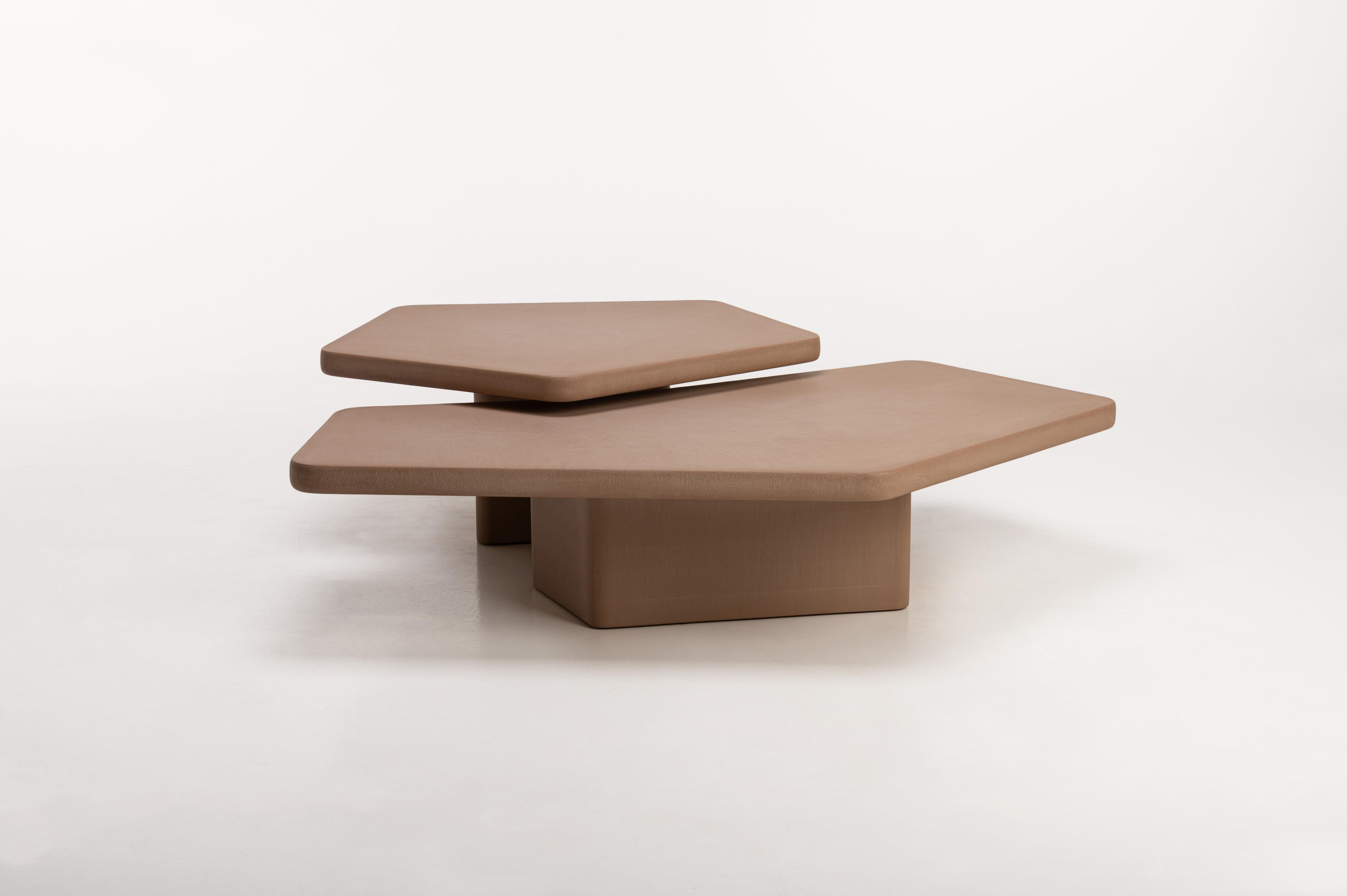 Contemporary Belgian design, handmade natural plaster coffee table set (Angus & Sami) with a textured and earthy character.

Indoor use (price outdoor +10%)

The coffee tables are handcrafted with multiple layers Mortex® on a wooden base. Mortex is