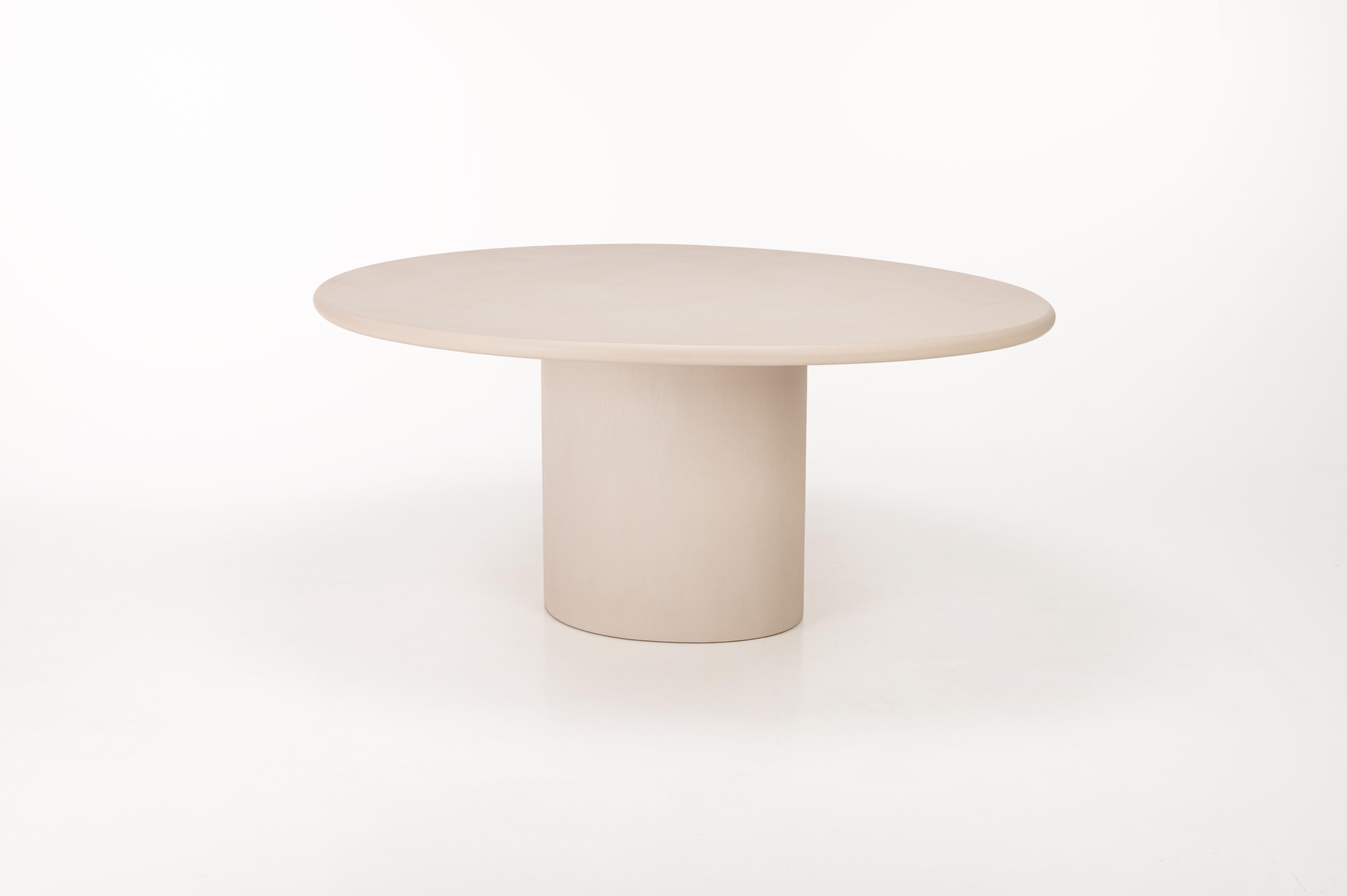 Contemporary Belgian design. Organic shaped table. Unique handmade natural plaster table with a textured and earthy character. Stain free and very easy to maintain. Unlike natural stone, the plaster surface has a very pleasant perceived temperature.