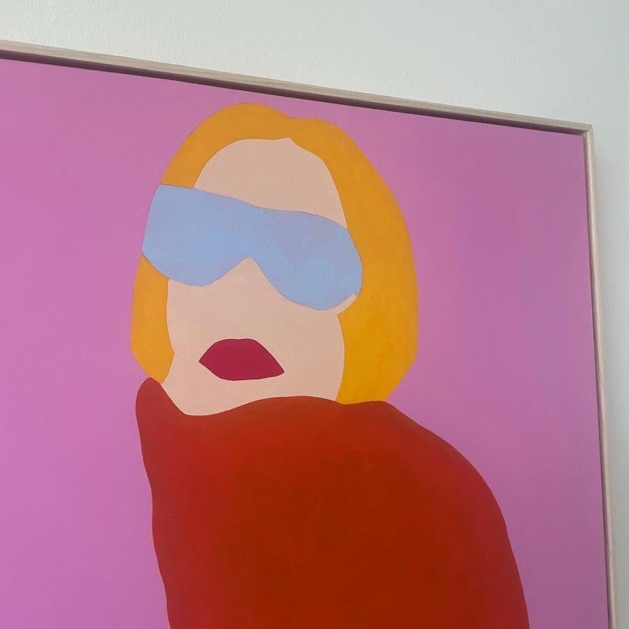 Este cuadro boho op art vintage es una pieza atrevida y artística, perfecta para interiores modernos o eclécticos. Con un vibrante fondo rosa, una figura dinámica con unas llamativas gafas de sol azules y un pañuelo rojo, esta obra de arte combina