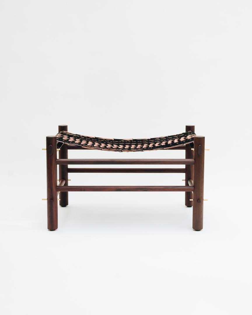 The piece incorporates hammock weaving into a comfortable and functional ottoman. Small bronze bolts make assembly and disassembly easy, they also give the piece stability. Káan Ottoman combines the native tropical wood of southern Mexico with