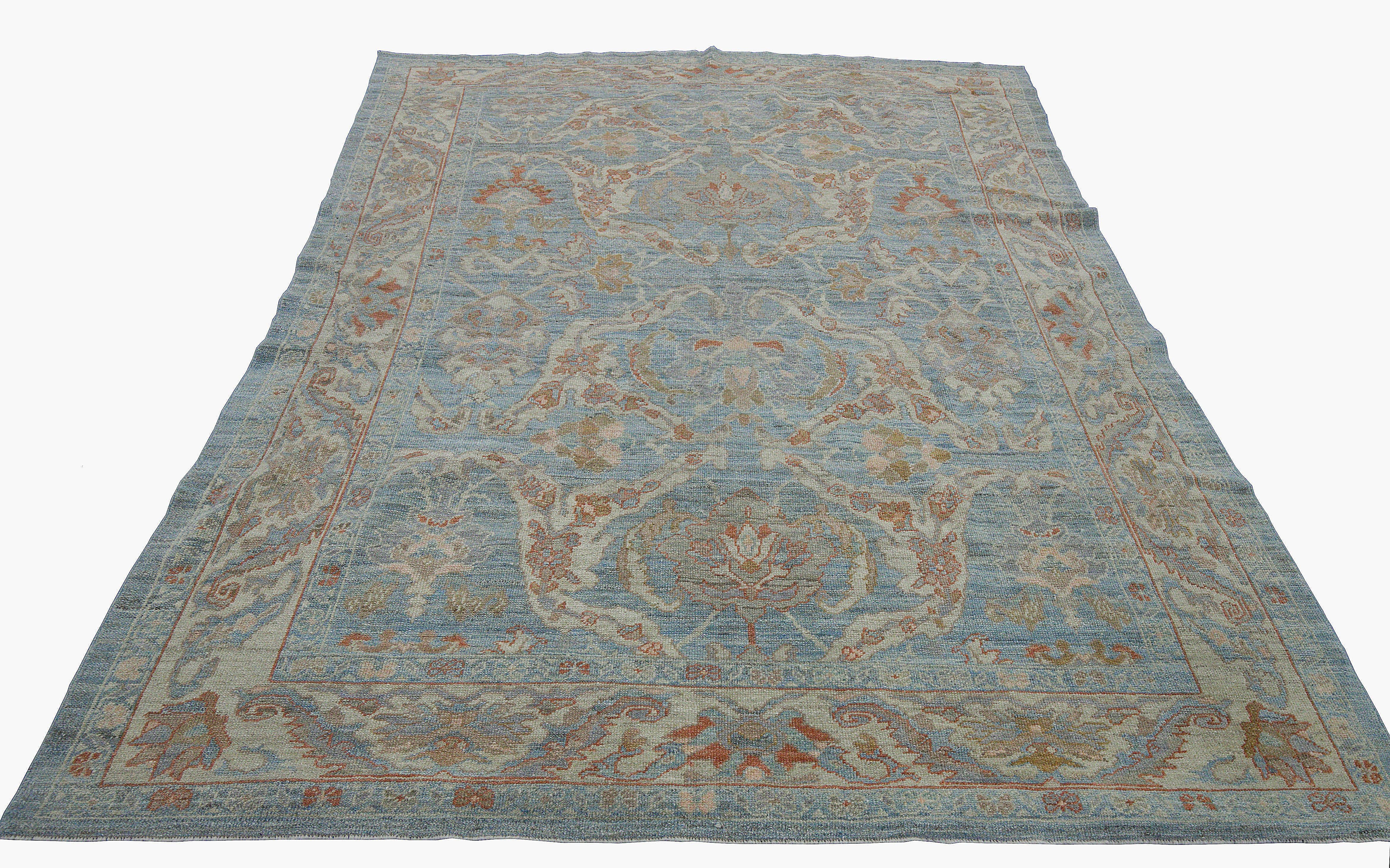 Hand-Woven Contemporary Oushak Rug with Blue Field and Floral Patterns in Beige and Brown For Sale
