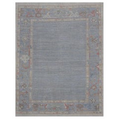 Contemporary Oushak Rug with Bluish Gray Field and Beige with Rust Borders