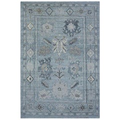 Contemporary Oushak Rug with Floral Details in Navy and Gray on Blue Field