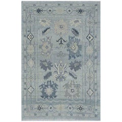 Contemporary Oushak Rug with Floral Patterns in White and Gray on Blue Field
