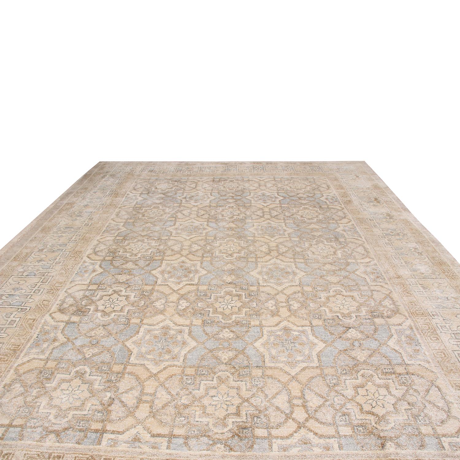 Hand knotted in high-quality wool with accenting, luminous silk originating from India, this Oushak rug enjoys an attentive but whimsical field pattern, expanding with an intricate distribution of the artisanal brown, beige, and sky blue colorways