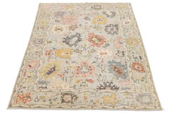 Zeitgenössischer Teppich Oushak Transitional Muted Earth Tones & Large Floral Medallions