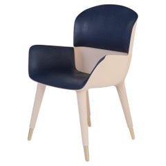 Poltrona da pranzo contemporanea per esterni con pelle indaco e accenti dorati