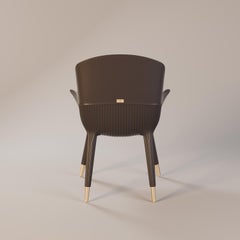 Modern Outdoor Dining Armchair Featuring Brown Leather Upholstery