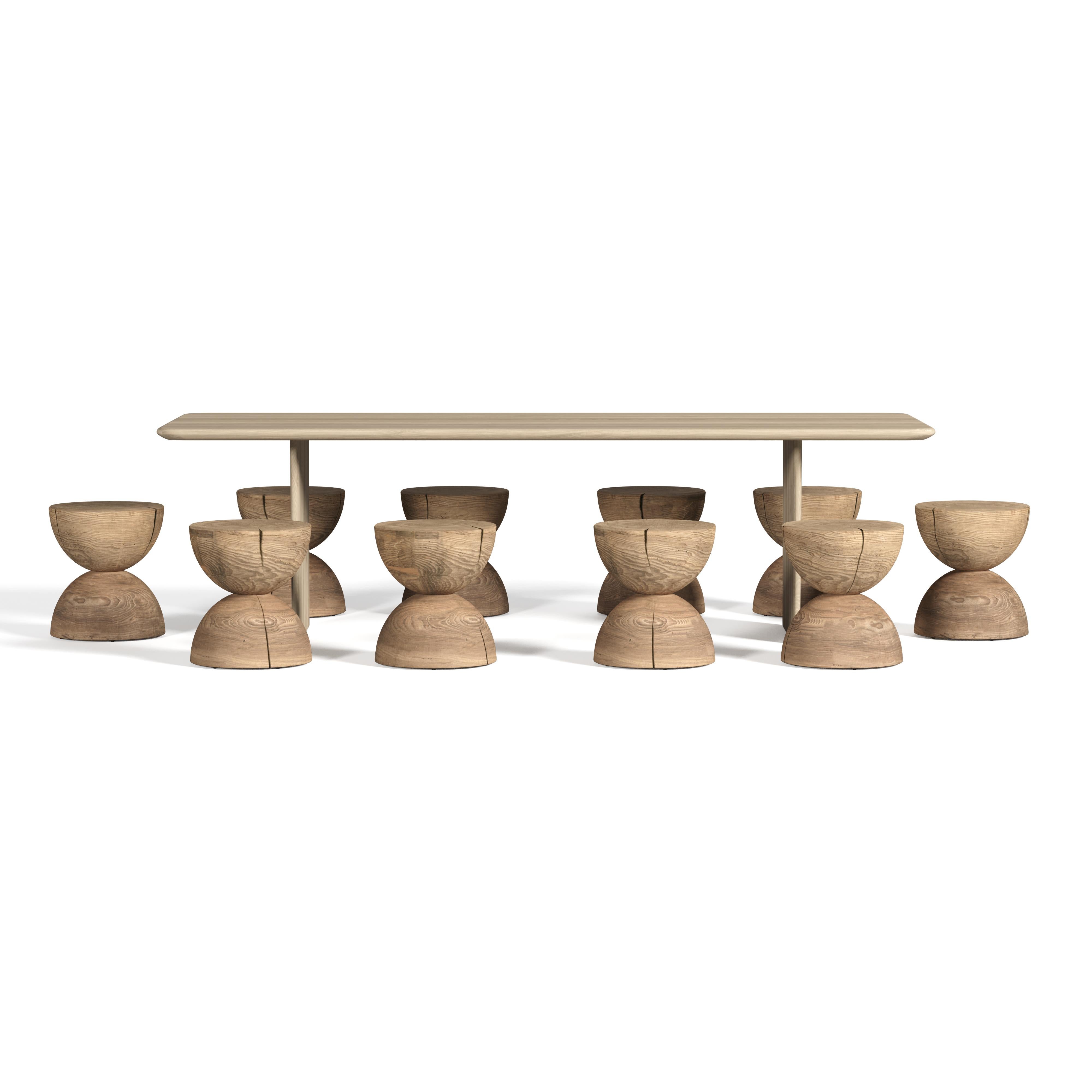 This outdoor collection, entirely crafted in Italy, features a dining table and stools made from cedar wood, all designed for outdoor use.

Table with structure in cedar wood ,with smooth, rounded sides. Its top and legs have a slender appearance