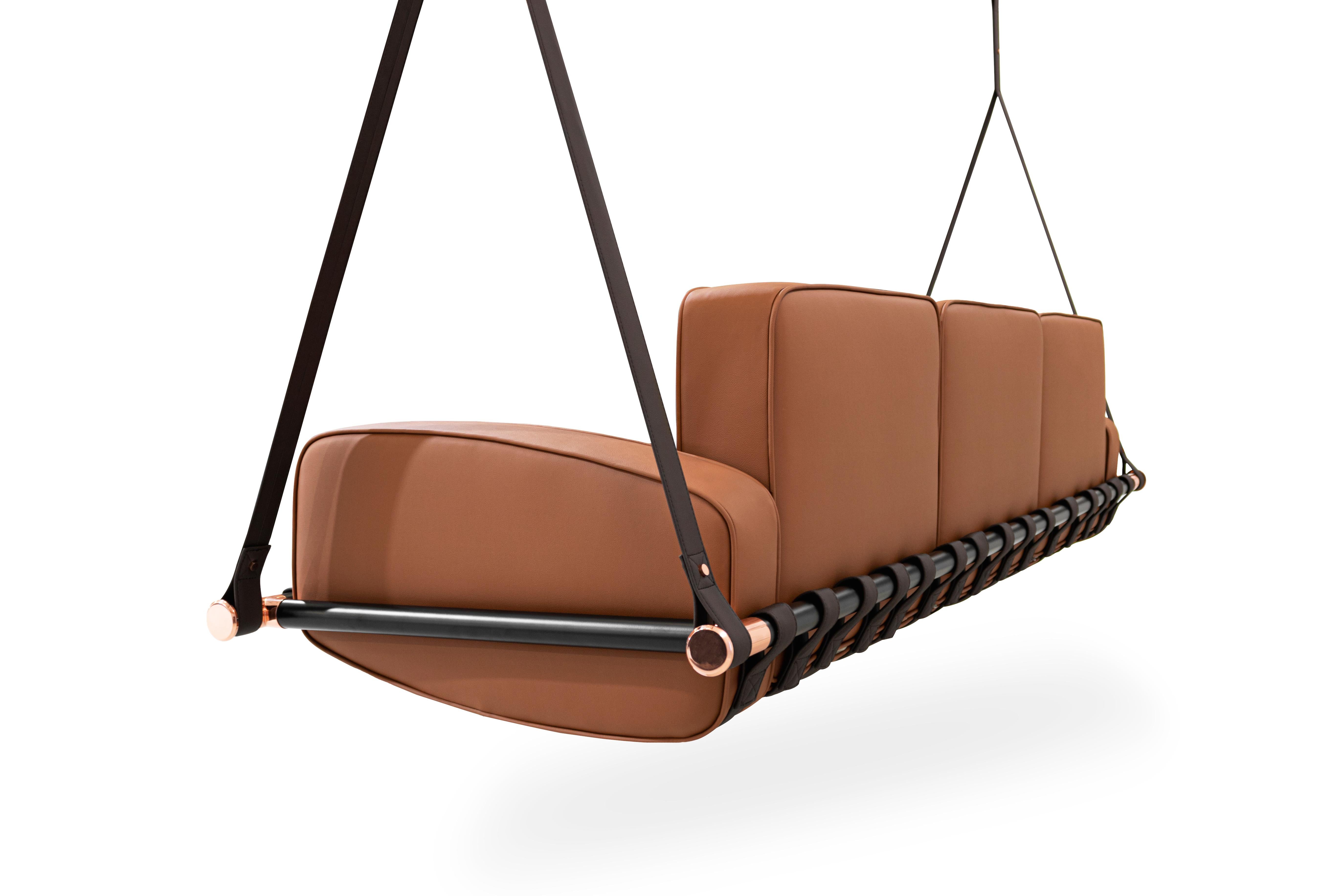 Fable - Hanging sofa by Myface

21st century contemporary outdoor hanging sofa made with suspension: Outdoor leather straps, Metallic, Structure: Black lacquered stainless steel, Upholstery: Acrylic fabric, Metallic Details: Gold plated 

Hold by
