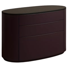 Cassettiera ovale contemporanea in laccato melanzana e rovere affumicato