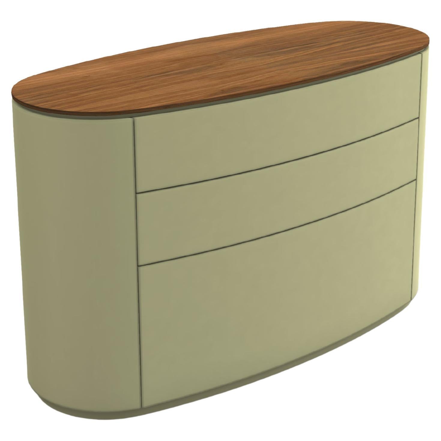 A minimal and elegant chest of drawers offered in a combination of solid wood tops with lacquered structure. The seamless drawer fronts maintain clean lines with subtle horizontal grooves, offering a refined and contemporary aesthetic. A