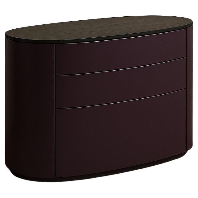 Cassettiera ovale contemporanea in laccato melanzana e rovere affumicato