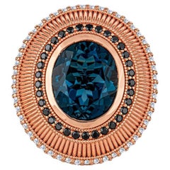 Contemporary Oval Cut London Blue Topaz Cocktail Ring with Sapphires & Diamonds
