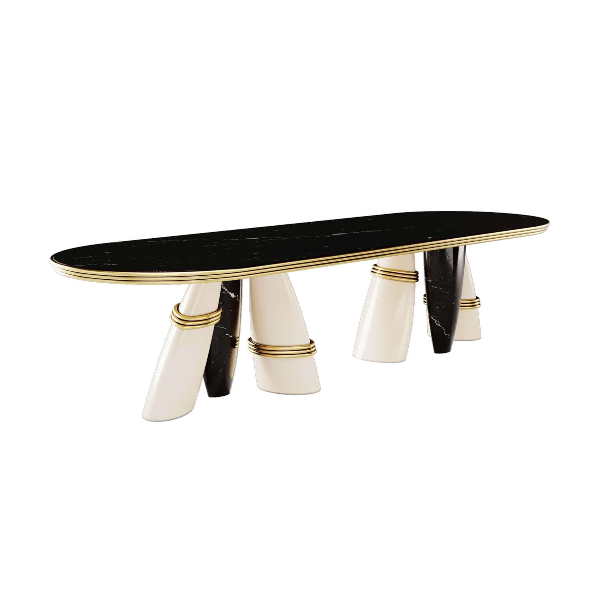 Billie Dining Table owns a striking attitude and sculptural shapes. A modern marble table with polished brass details promises to steal the show of any contemporary dining room design

Materials: Top in Polished Nero Marquina; Legs in Polished Nero