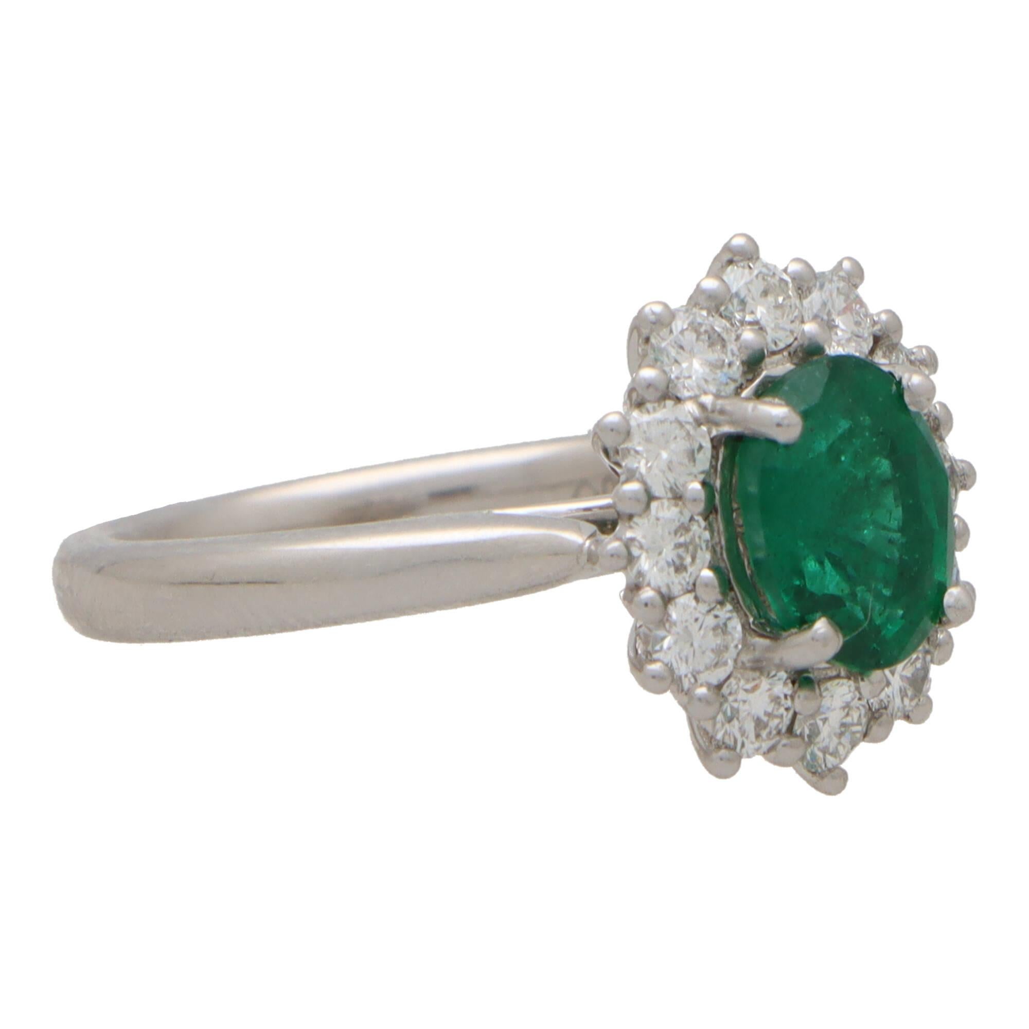 Oval Cut Contemporary Oval Emerald and Diamond Cluster Ring Set in Platinum For Sale