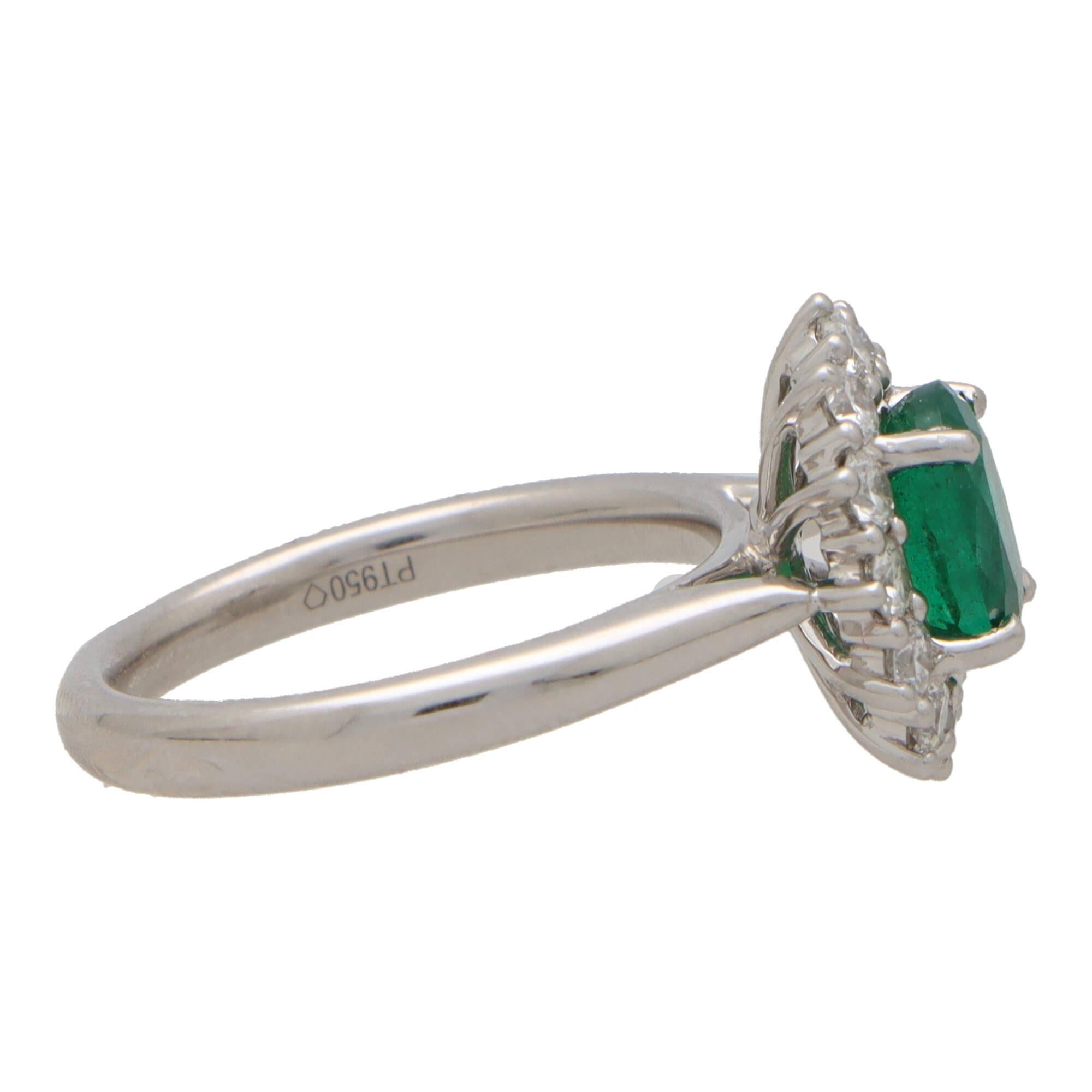 Contemporary Oval Emerald and Diamond Cluster Ring Set in Platinum In New Condition For Sale In London, GB