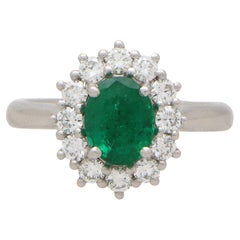 Contemporary Oval Emerald and Diamond Cluster Ring Set in Platinum