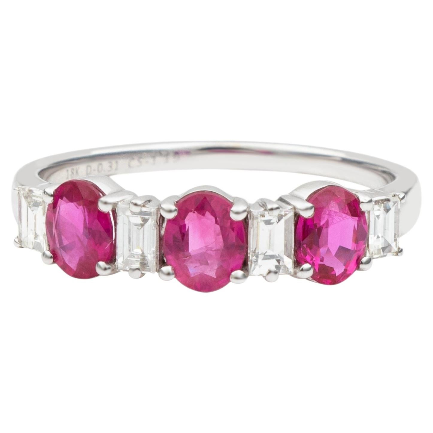 Contemporary Oval Ruby Ring with Emerald Cut Diamond Spacers in 18k White Gold