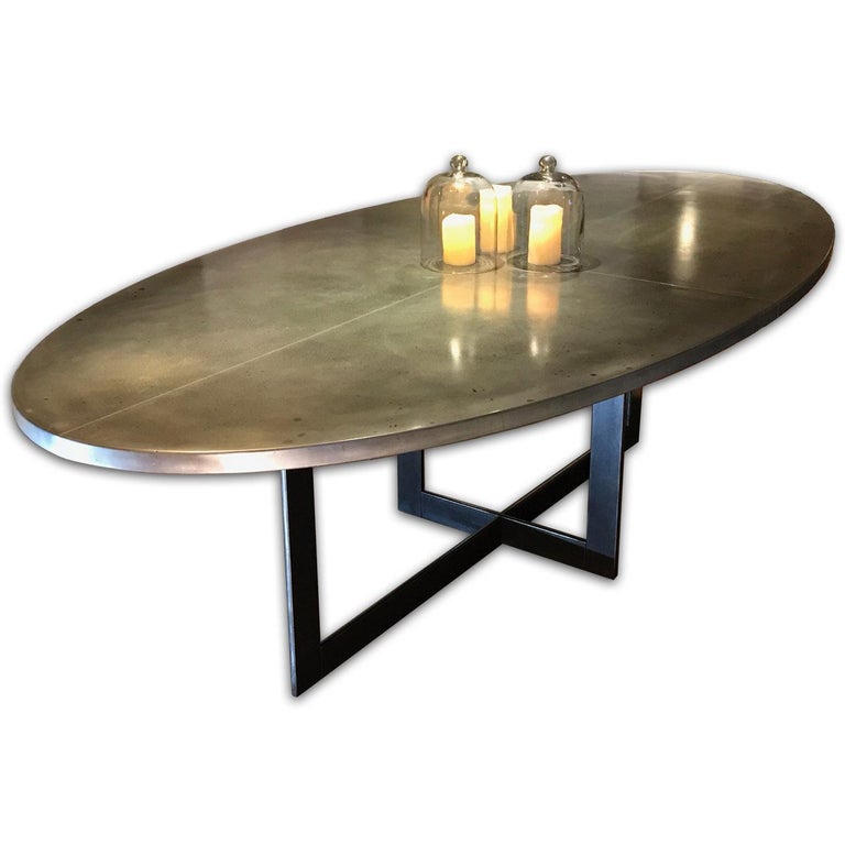 Contemporary Oval Shaped Zinc Top Dining Table On Steel Legs For An Andrew Nebbett Designs Contemporary Oval Zinc Top Dining Table With Square Profile Edges