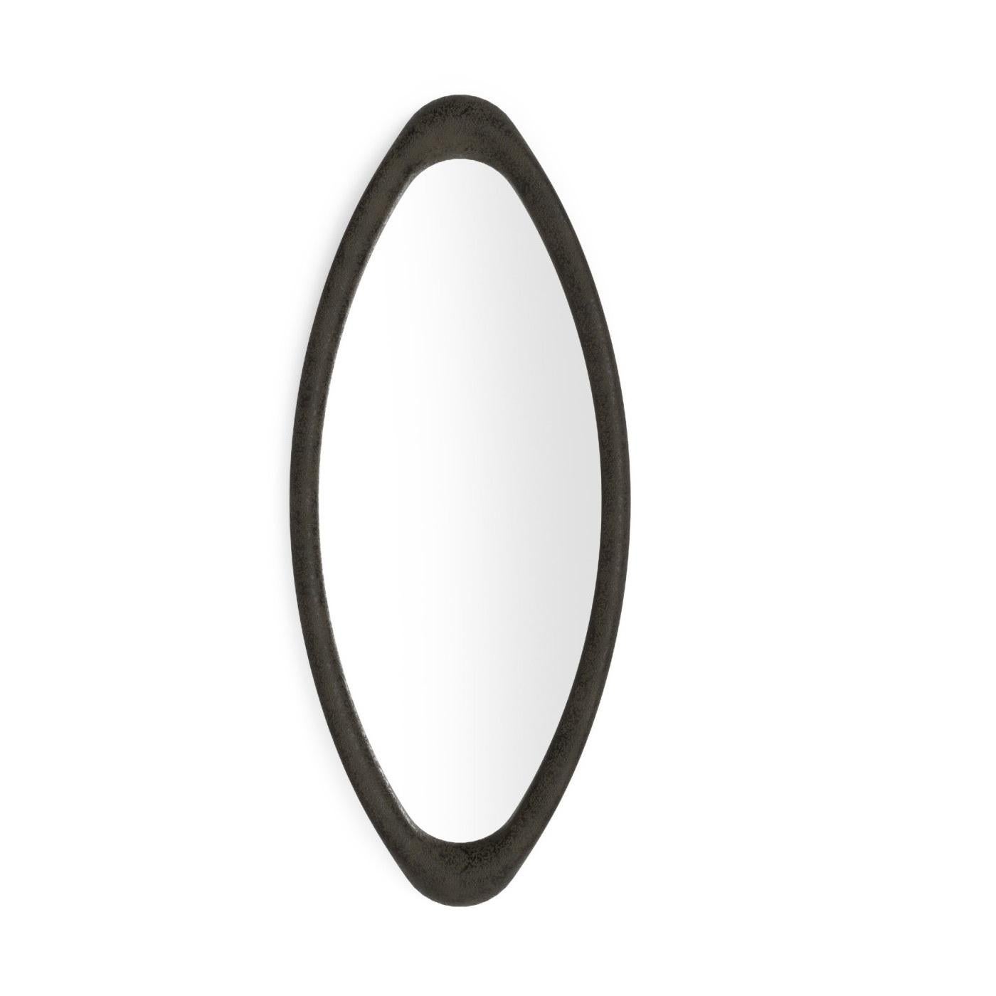 Experience the elegance of this wall Mirror, an oval masterpiece crafted to redefine any environment. Its resin frame boasts a unique 'Volcanic' finish, imparting both texture and refinement. Versatility is key with its ample proportions, offering