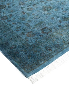 Tappeto contemporaneo in lana sovratinta annodata a mano di colore blu