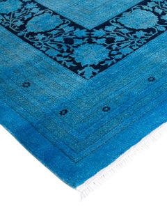 Tappeto contemporaneo in lana sovratinta annodata a mano di colore blu