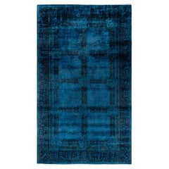 Tappeto contemporaneo in lana sovratinta annodata a mano di colore blu