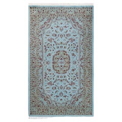 Tapis de sol contemporain en laine surteinte nouée à la main, bleu