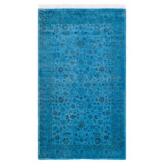 Tapis de sol contemporain en laine surteinte nouée à la main, bleu
