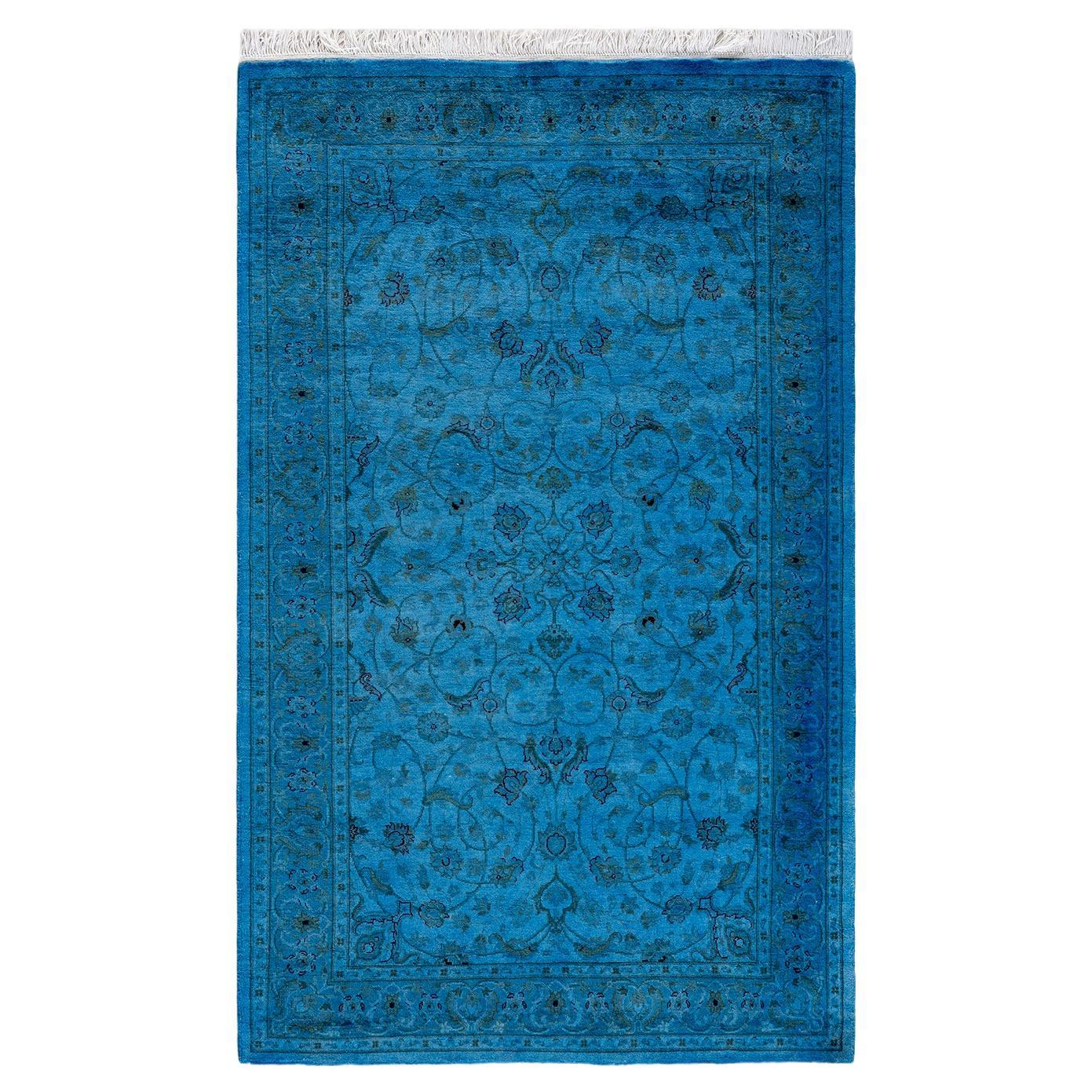 Tappeto contemporaneo in lana sovratinta annodata a mano di colore blu