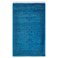 Tapis de sol contemporain en laine surteinte nouée à la main, bleu