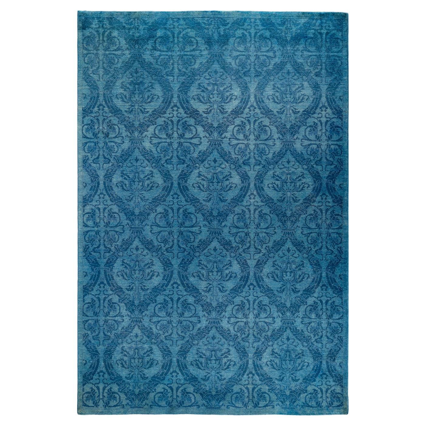 Tappeto contemporaneo in lana sovratinta annodata a mano di colore blu